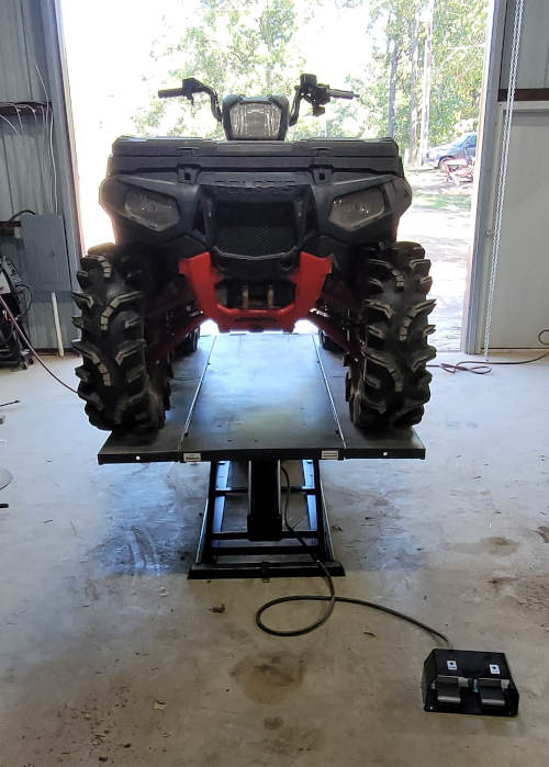Polaris Sportsman on top of Elevator 1100A Lift Table David Louisiana